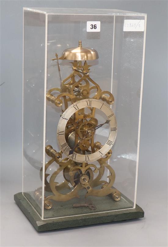 A brass skeleton clock, with fusee movement